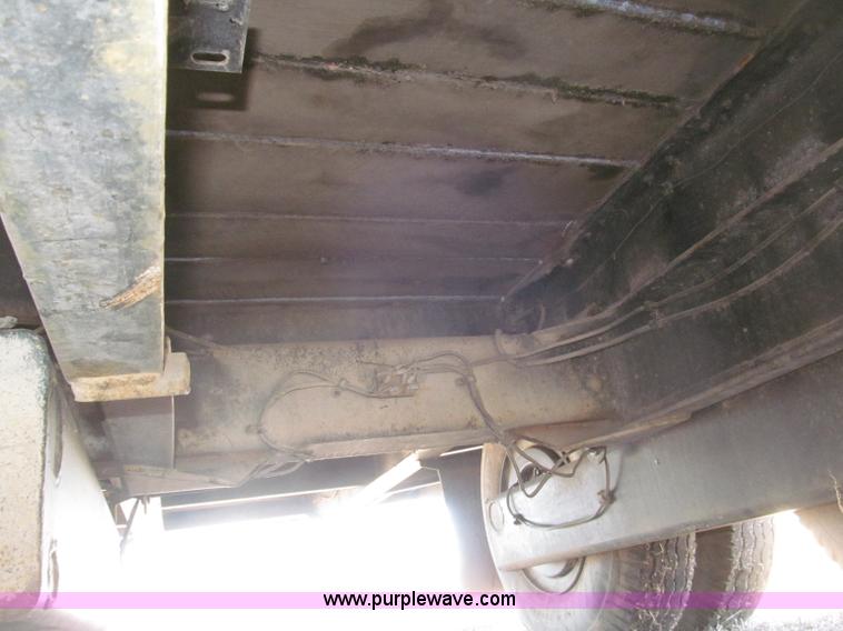 image for item B5327 1980 Miller 20T tilt deck tandem axle trailer