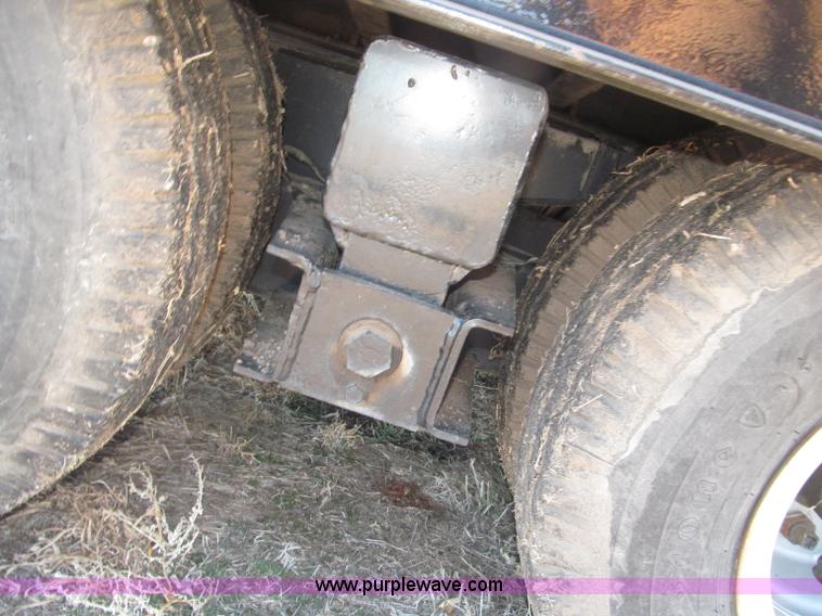 image for item B5327 1980 Miller 20T tilt deck tandem axle trailer