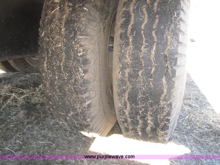 image for item B5327 1980 Miller 20T tilt deck tandem axle trailer