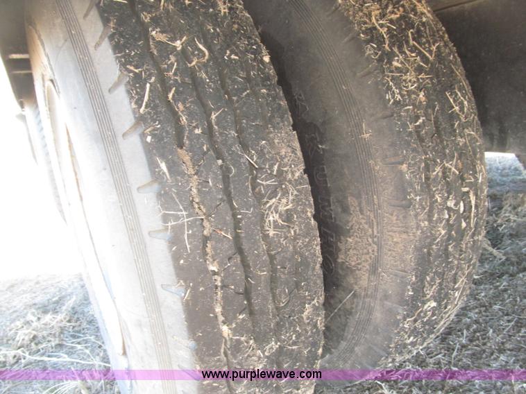 image for item B5327 1980 Miller 20T tilt deck tandem axle trailer