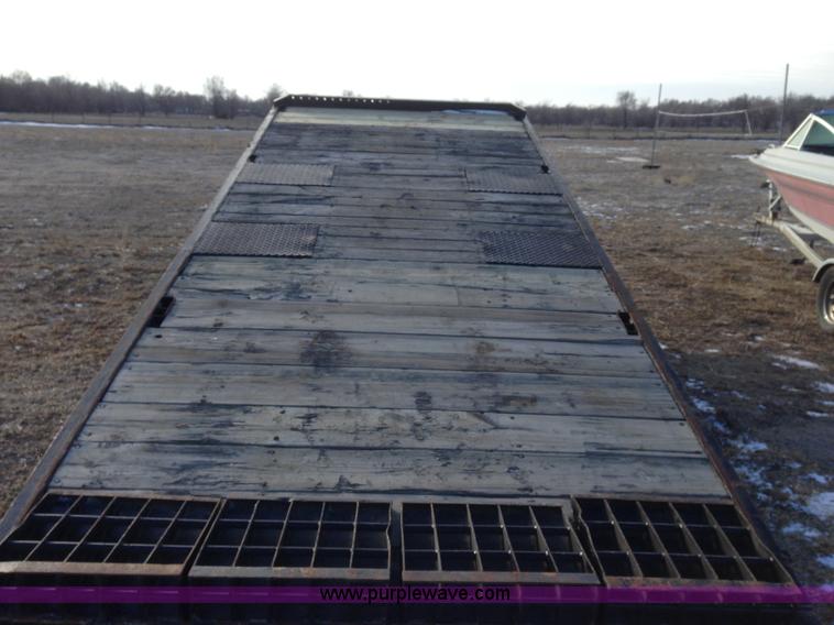 image for item B5327 1980 Miller 20T tilt deck tandem axle trailer