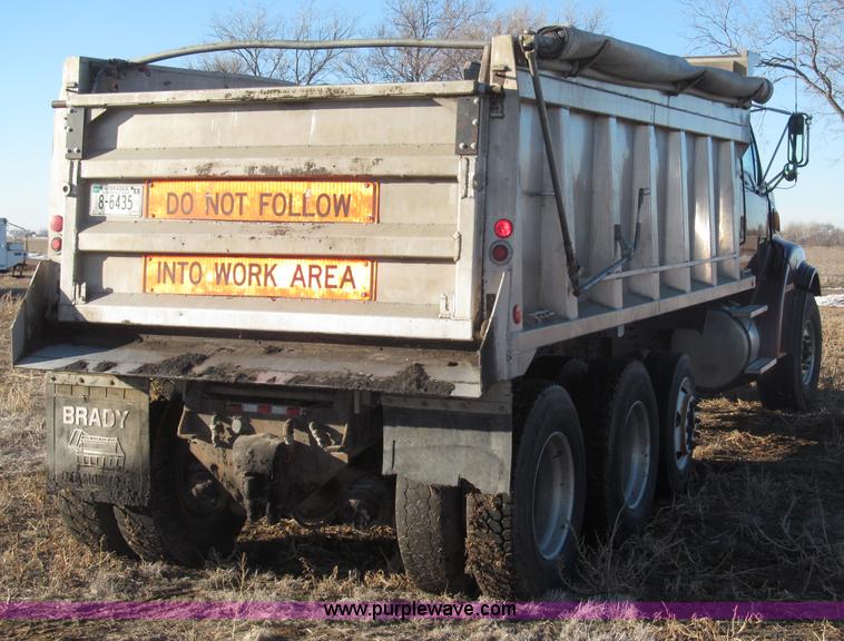 image for item B5332 1998 Ford LT9511 tri axle dump truck