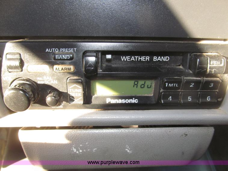 image for item B5332 1998 Ford LT9511 tri axle dump truck