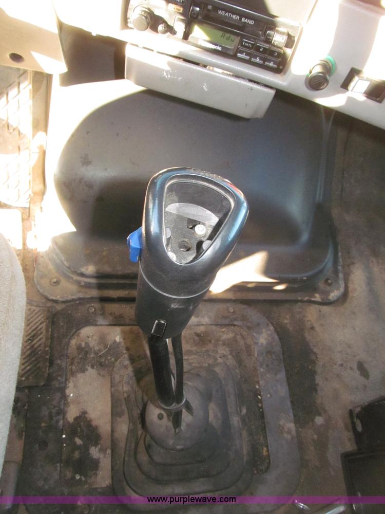 image for item B5332 1998 Ford LT9511 tri axle dump truck