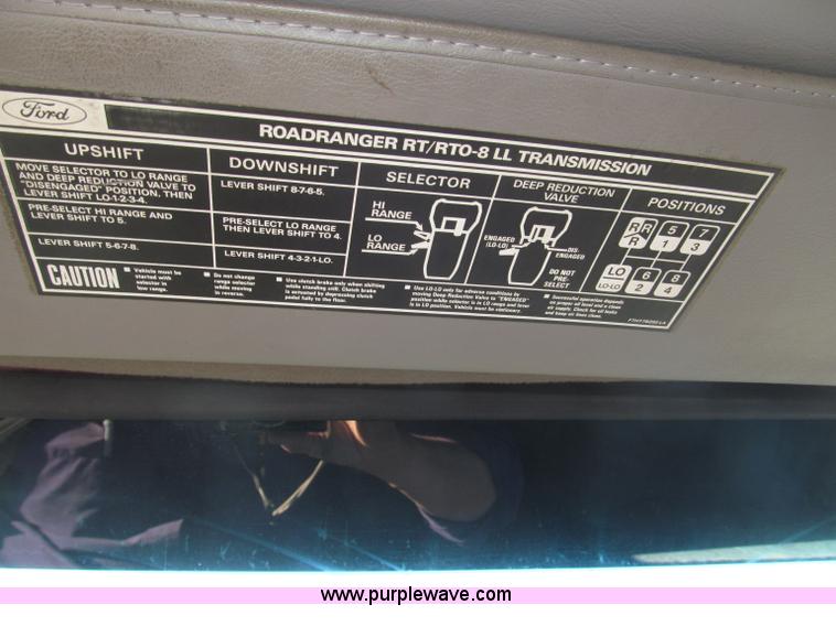 image for item B5332 1998 Ford LT9511 tri axle dump truck