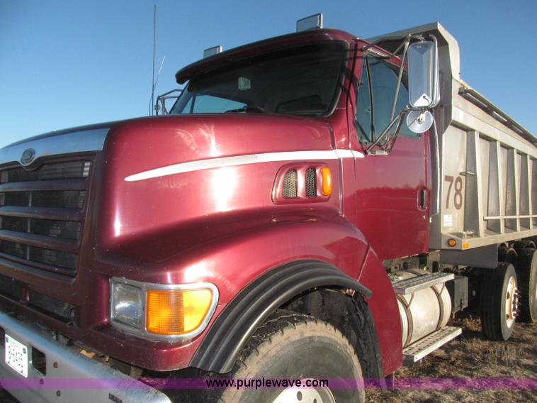 image for item B5332 1998 Ford LT9511 tri axle dump truck