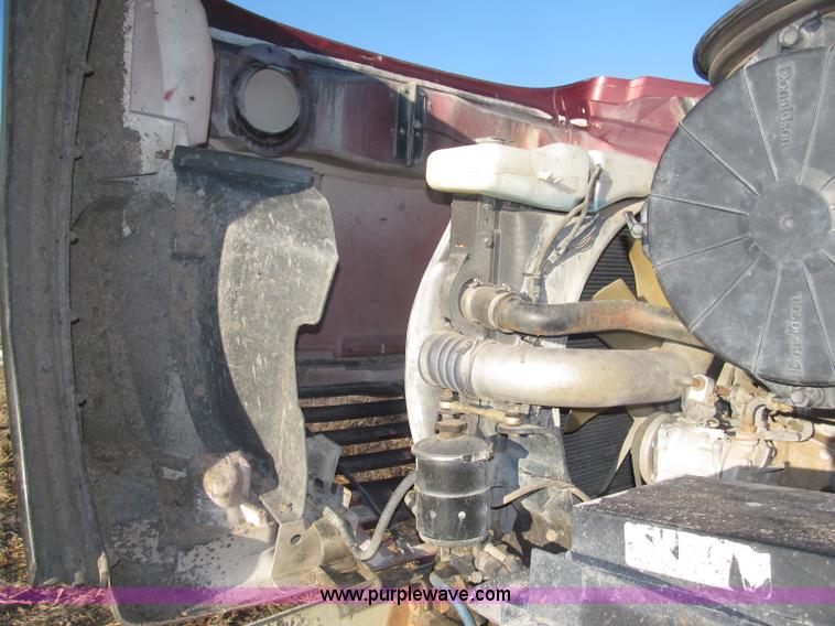 image for item B5332 1998 Ford LT9511 tri axle dump truck