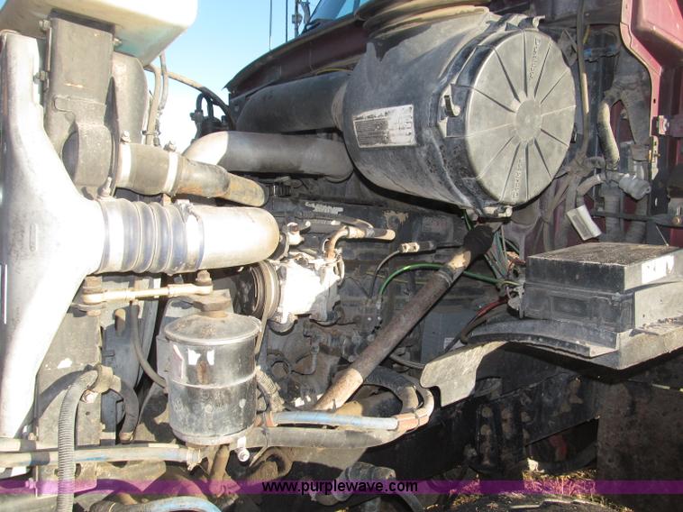 image for item B5332 1998 Ford LT9511 tri axle dump truck