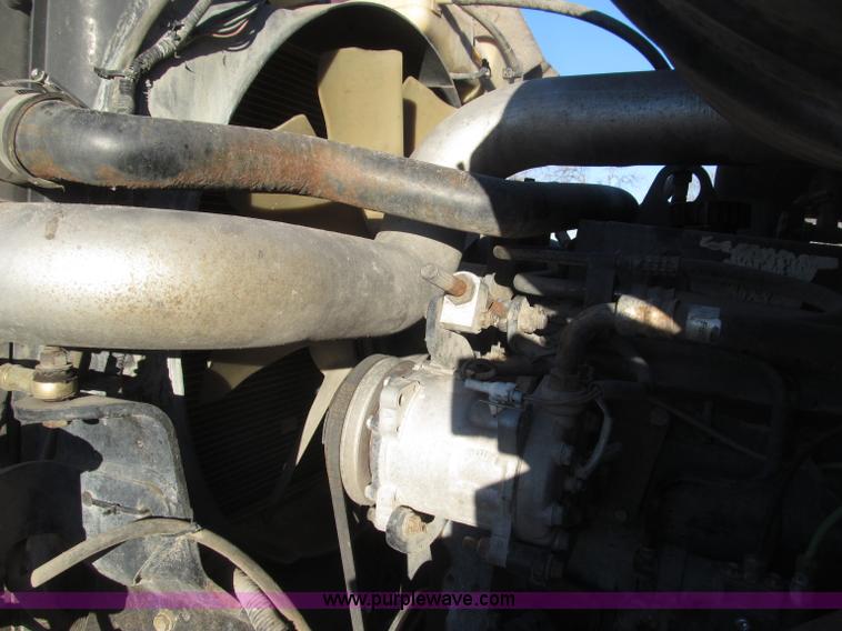 image for item B5332 1998 Ford LT9511 tri axle dump truck