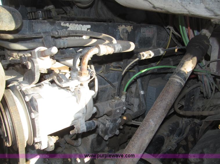 image for item B5332 1998 Ford LT9511 tri axle dump truck