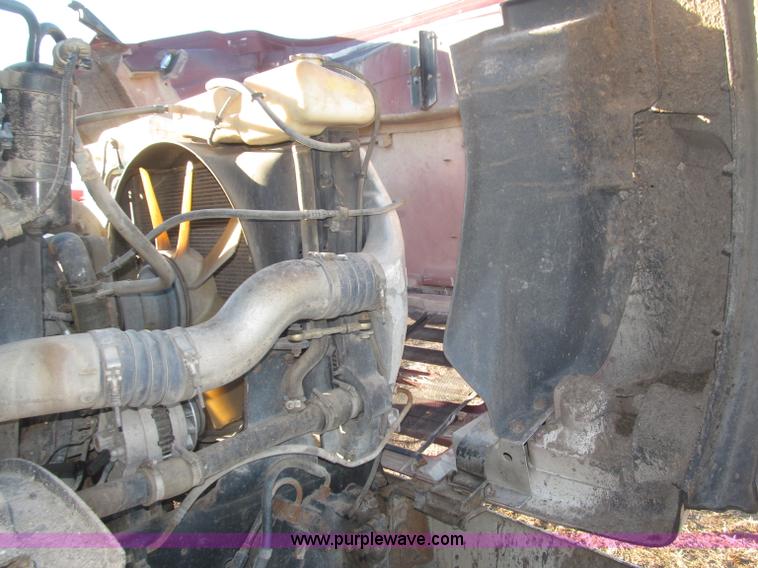 image for item B5332 1998 Ford LT9511 tri axle dump truck