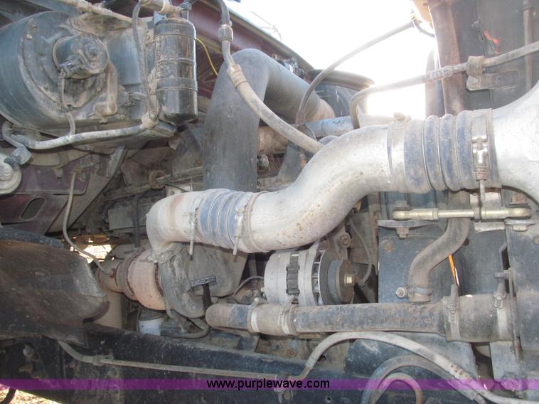 image for item B5332 1998 Ford LT9511 tri axle dump truck