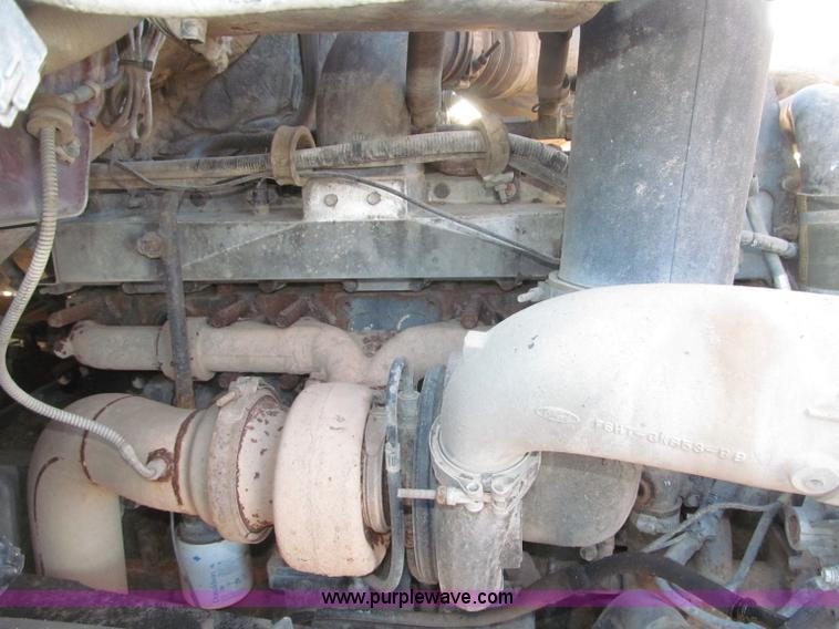 image for item B5332 1998 Ford LT9511 tri axle dump truck