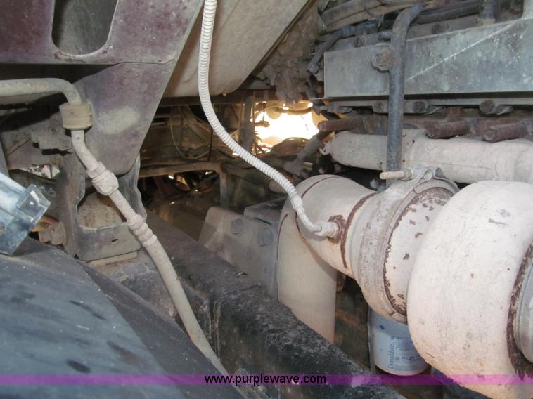 image for item B5332 1998 Ford LT9511 tri axle dump truck