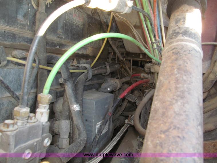 image for item B5332 1998 Ford LT9511 tri axle dump truck