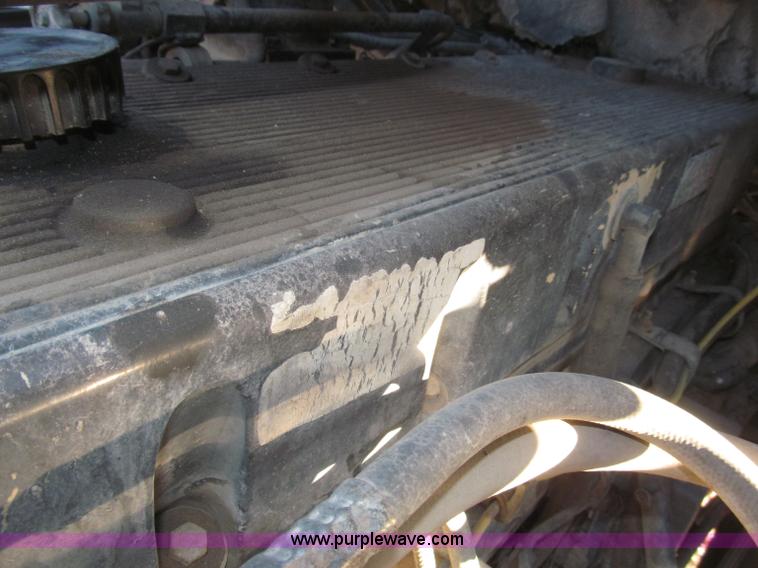 image for item B5332 1998 Ford LT9511 tri axle dump truck