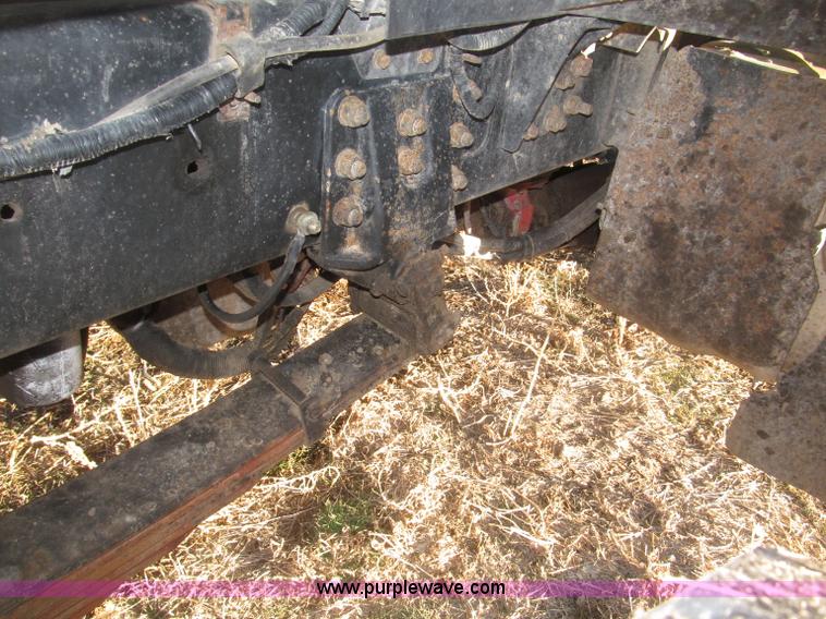 image for item B5332 1998 Ford LT9511 tri axle dump truck