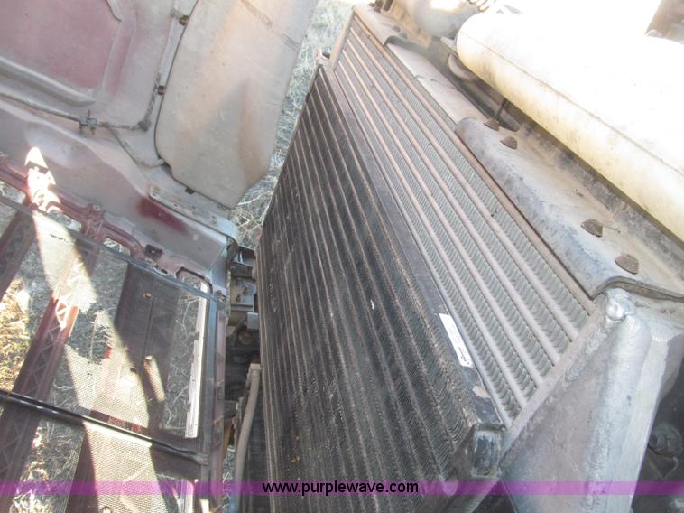 image for item B5332 1998 Ford LT9511 tri axle dump truck