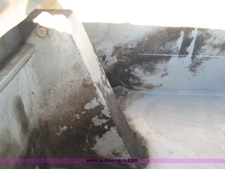 image for item B5332 1998 Ford LT9511 tri axle dump truck