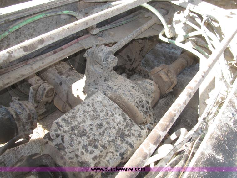 image for item B5332 1998 Ford LT9511 tri axle dump truck