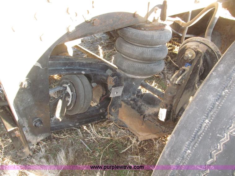 image for item B5332 1998 Ford LT9511 tri axle dump truck