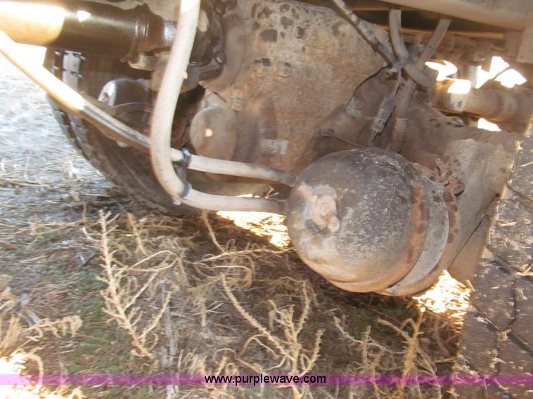image for item B5332 1998 Ford LT9511 tri axle dump truck