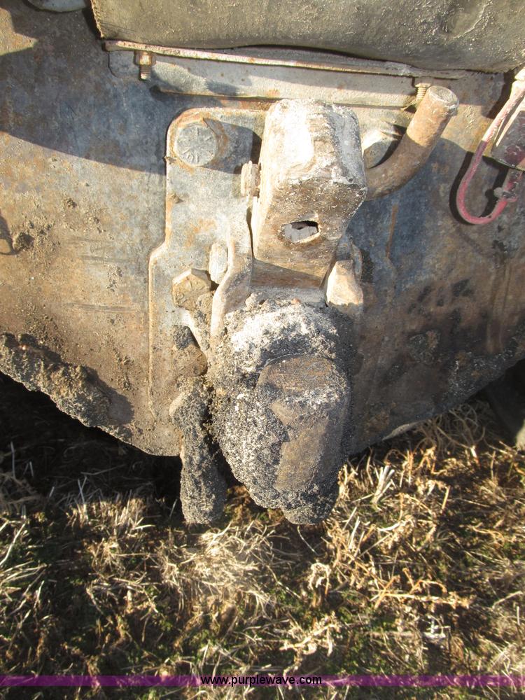 image for item B5332 1998 Ford LT9511 tri axle dump truck