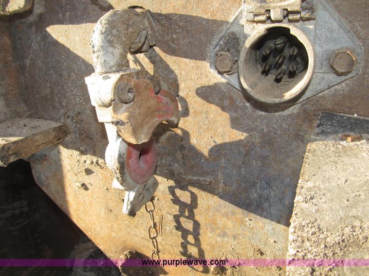 image for item B5332 1998 Ford LT9511 tri axle dump truck