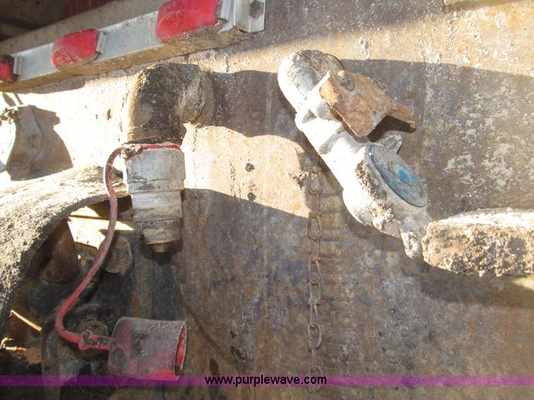 image for item B5332 1998 Ford LT9511 tri axle dump truck