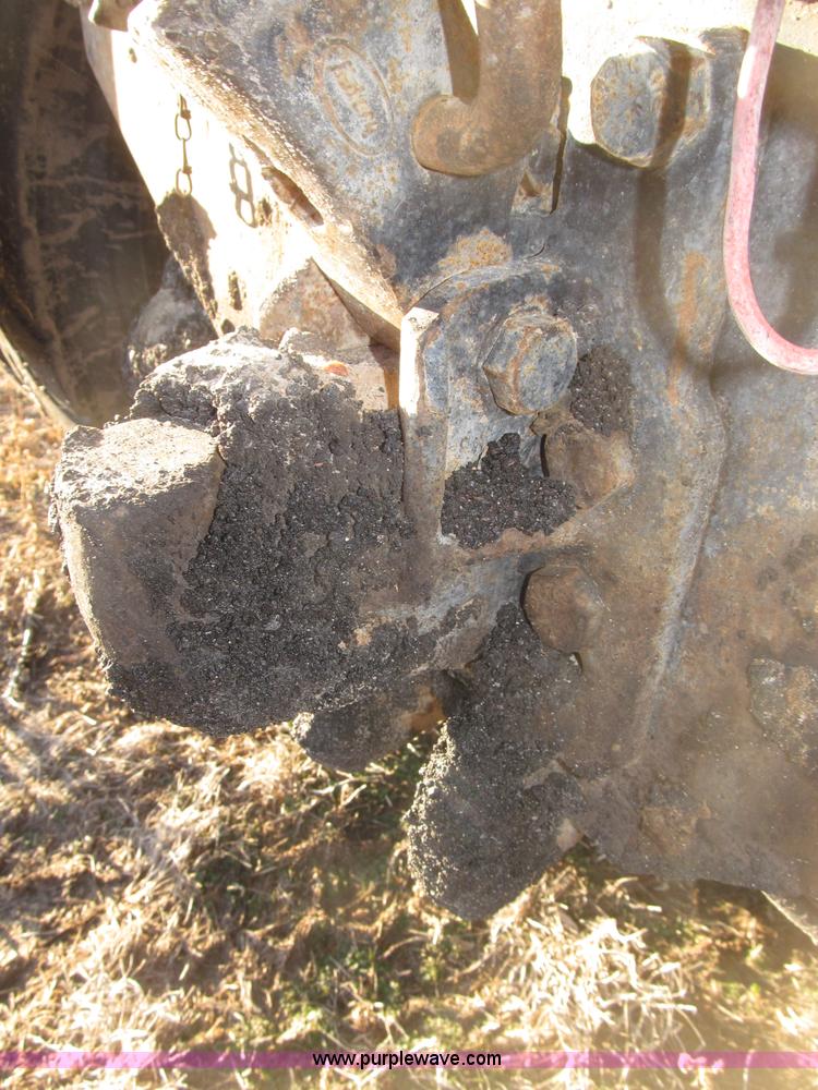 image for item B5332 1998 Ford LT9511 tri axle dump truck