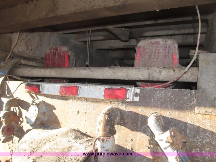 image for item B5332 1998 Ford LT9511 tri axle dump truck