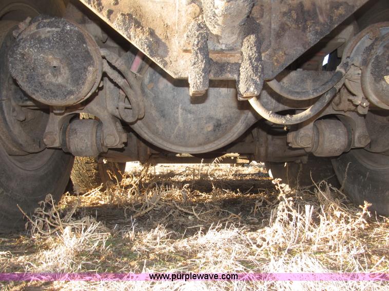 image for item B5332 1998 Ford LT9511 tri axle dump truck