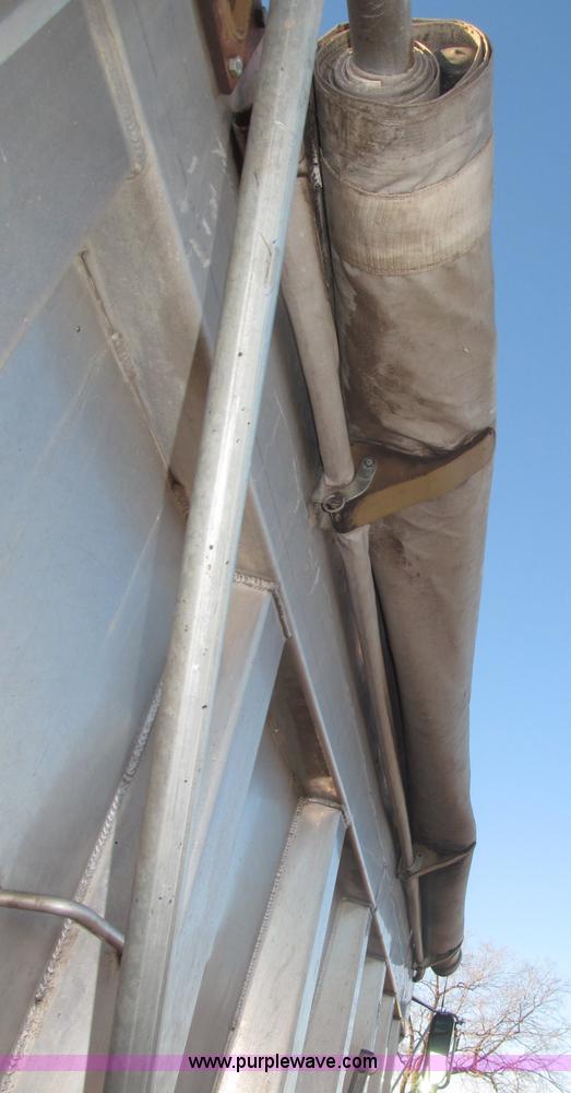 image for item B5332 1998 Ford LT9511 tri axle dump truck