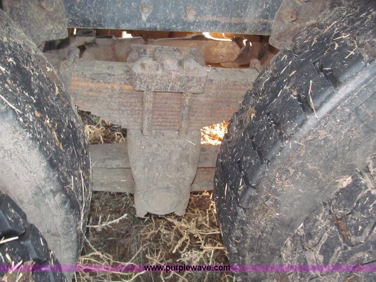 image for item B5332 1998 Ford LT9511 tri axle dump truck