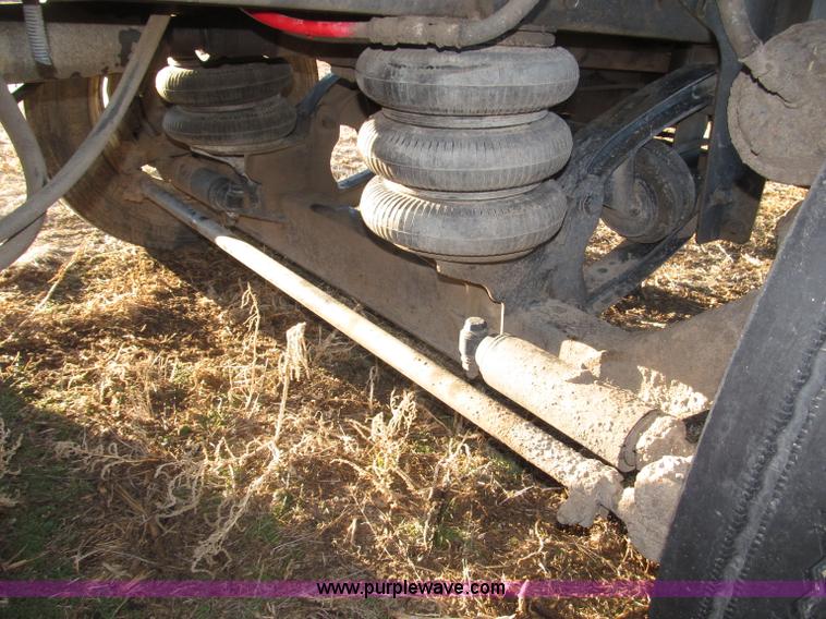 image for item B5332 1998 Ford LT9511 tri axle dump truck