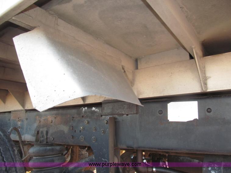 image for item B5332 1998 Ford LT9511 tri axle dump truck