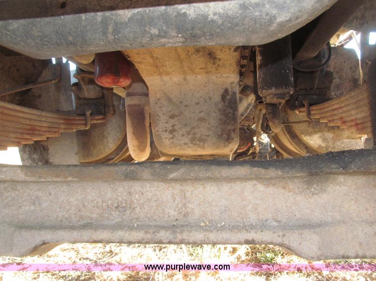 image for item B5332 1998 Ford LT9511 tri axle dump truck