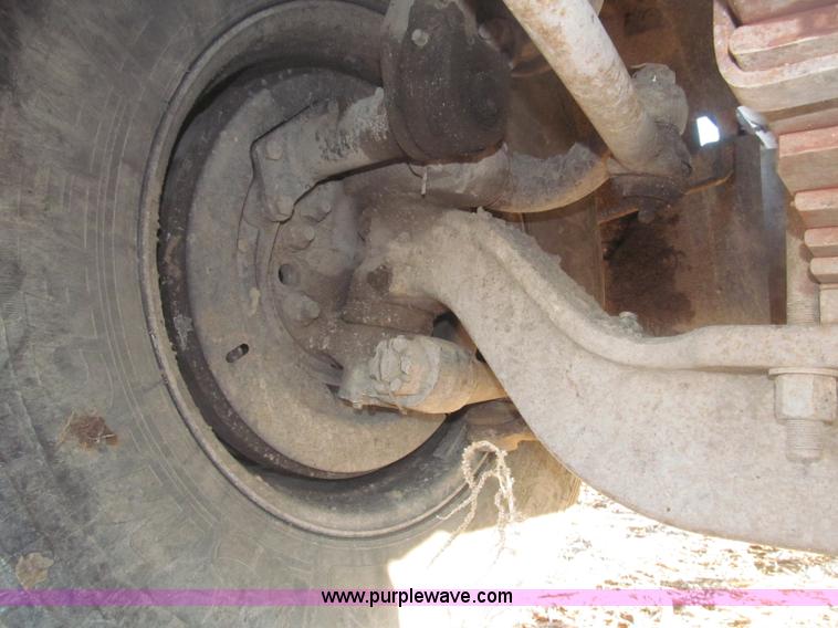 image for item B5332 1998 Ford LT9511 tri axle dump truck