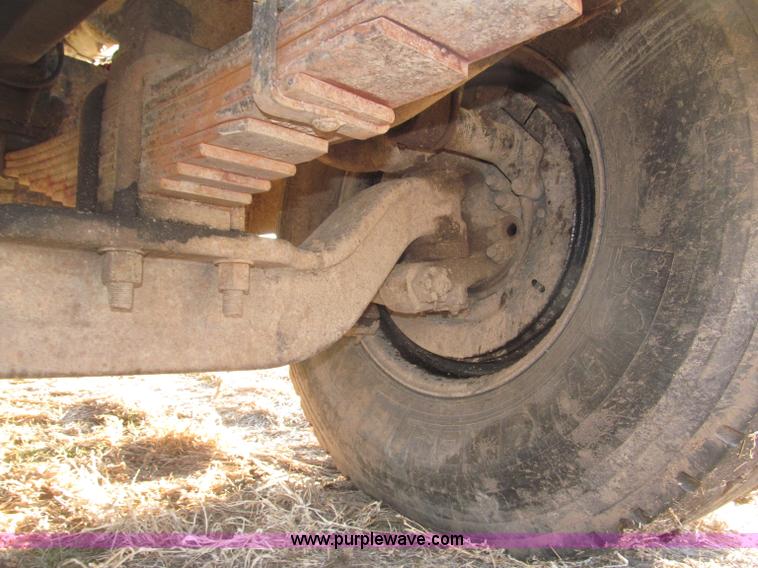 image for item B5332 1998 Ford LT9511 tri axle dump truck