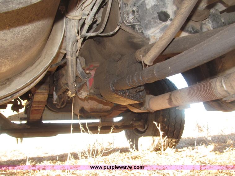 image for item B5332 1998 Ford LT9511 tri axle dump truck