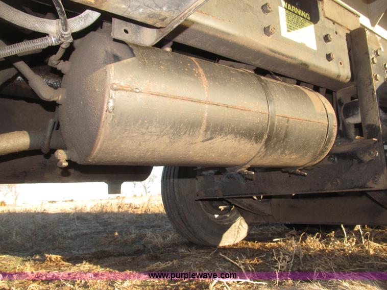 image for item B5332 1998 Ford LT9511 tri axle dump truck