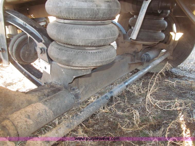 image for item B5332 1998 Ford LT9511 tri axle dump truck