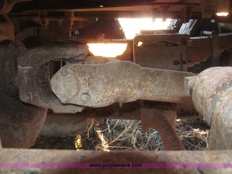 image for item B5332 1998 Ford LT9511 tri axle dump truck