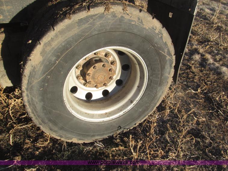 image for item B5332 1998 Ford LT9511 tri axle dump truck