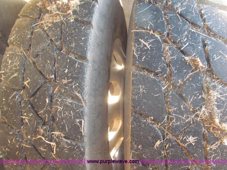 image for item B5332 1998 Ford LT9511 tri axle dump truck