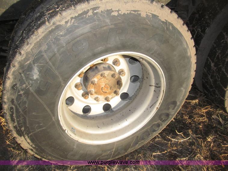 image for item B5332 1998 Ford LT9511 tri axle dump truck