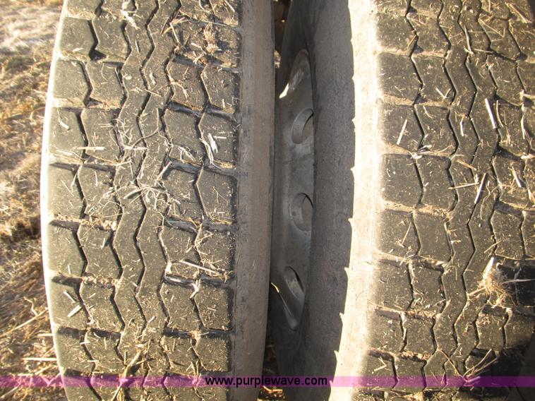 image for item B5332 1998 Ford LT9511 tri axle dump truck