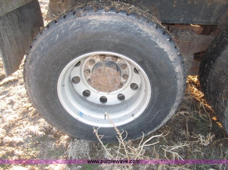 image for item B5332 1998 Ford LT9511 tri axle dump truck