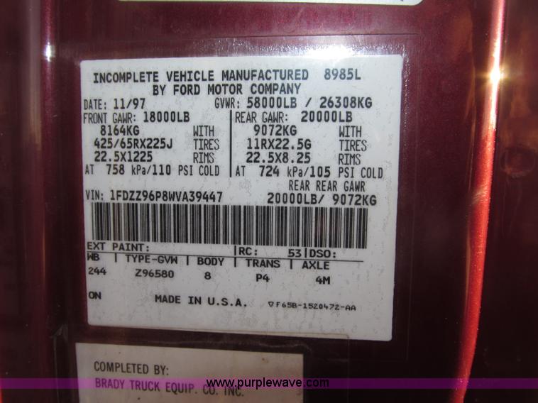 image for item B5332 1998 Ford LT9511 tri axle dump truck