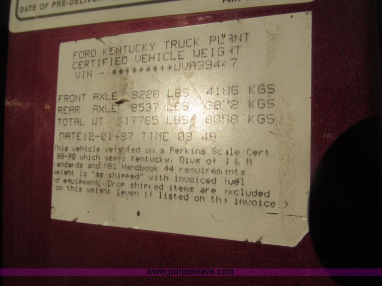 image for item B5332 1998 Ford LT9511 tri axle dump truck